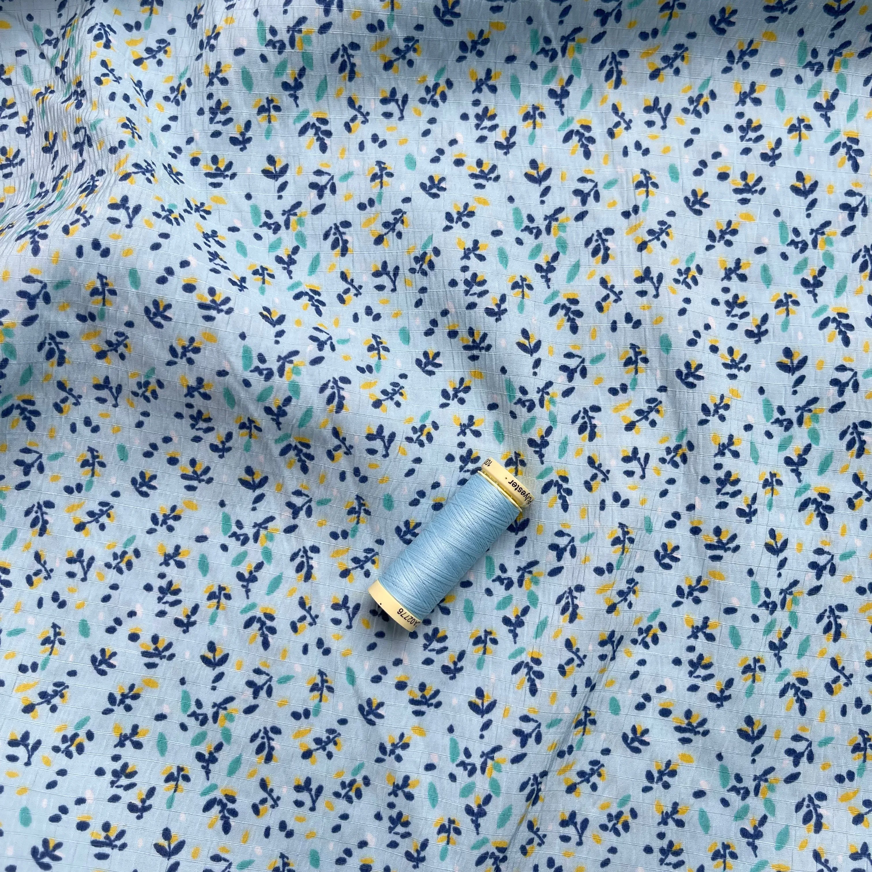 REMNANT 0.18 Metre - Ditsy Petals on Light Blue Viscose Seersucker Fabric